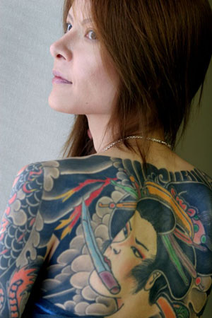 Shoko Tendo the daughter of yakuza boss Hiroyasu Tendo shows her tattoos 