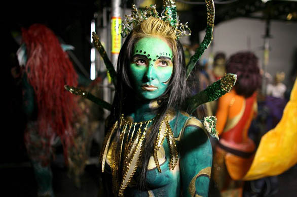 Students prepare backstage before performing in the Bodyspectra body painting event