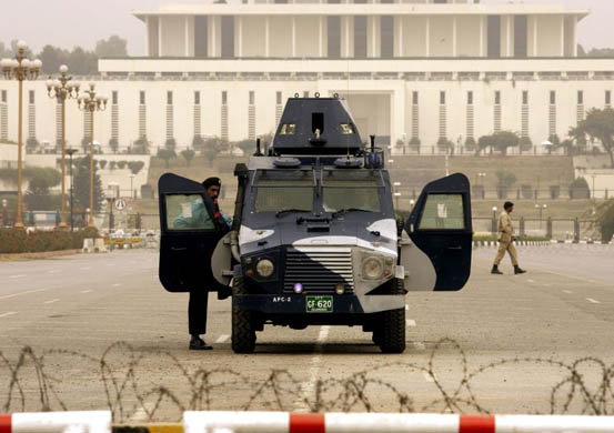 An armoured car parked in front of the presidential palace in Islamabad