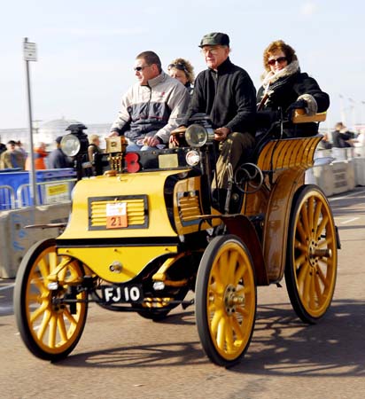 A yellow car arrives at the finish