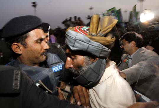 Protestor with police