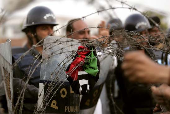 Police and barbed wire