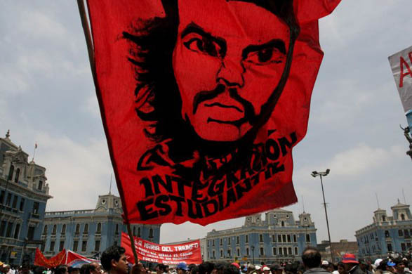 A demonstrator waves a flag during a protest
