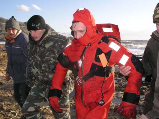 A rescuer arrives back