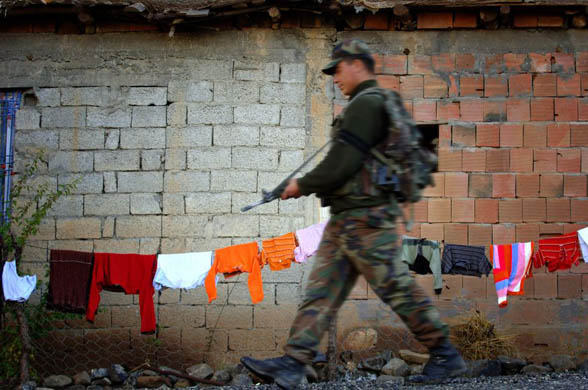 Commandos patrol in a village near the Turkish-Iraqi border