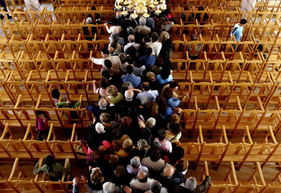Greek Cypriot Orthodox pilgrims queue to pay their respects to the skull of St John Chrysostom