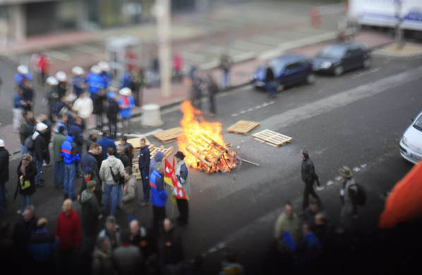 Power company EDF-GDF employees gather in front of the headquarters on the day of a nationwide strike