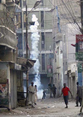A protestor with tear gas