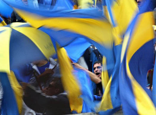 Boca Juniors fans cheer their team before the start of the 14th round match of the Argentinean Closing Tournament against River Plate