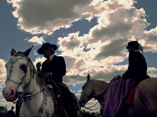 Gauchos wait to start a parade during a Tradition Day celebration