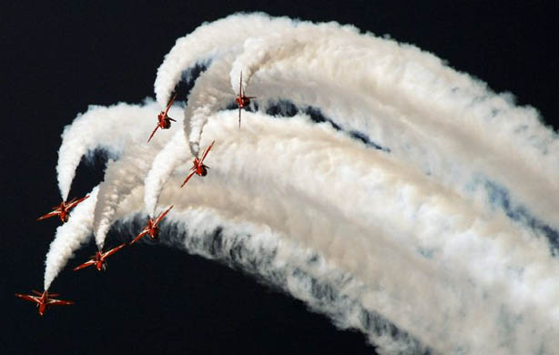 The Red Arrows perform a flying display during the 10th Dubai air show