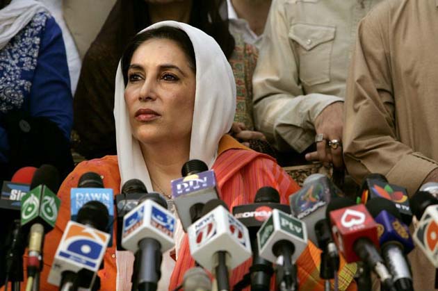 Benazir Bhutto speaks to the media