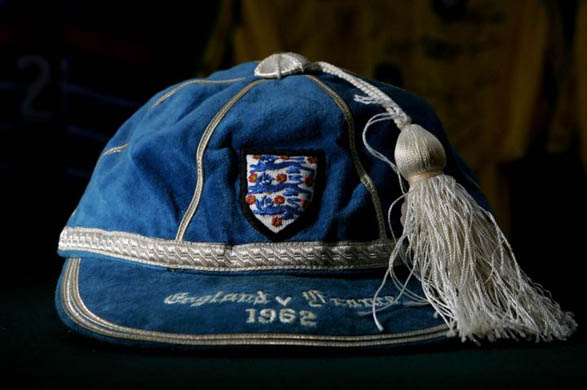 An international cap awarded to Bobby Moore when England drew with France in 1962 at Hillsborough