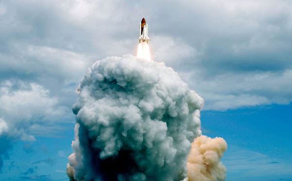 Space shuttle Discovery lifts off from launch pad 39A at the Kennedy space centre