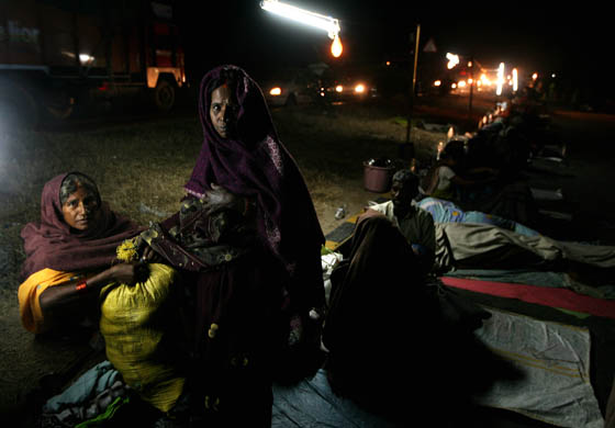 Women wake up on the side of the road during a march