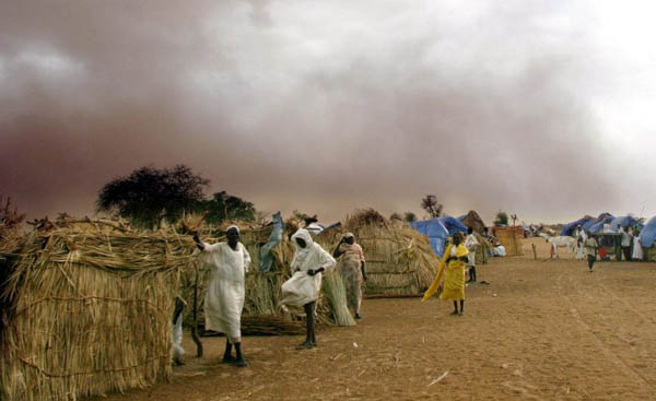 A sand and rain storm looming over Kalma refugee camp