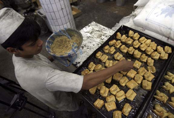 A baker makes sweets in preparation for Ramadan