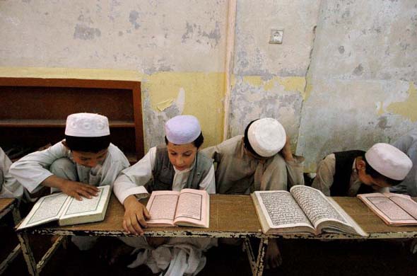 رمضان في افغانستان GD4630793@Afghan-boys-read-the--3007