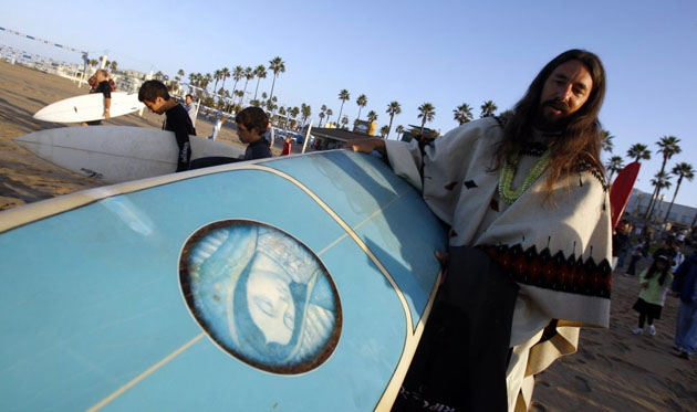 Surfing priest blesses the waves