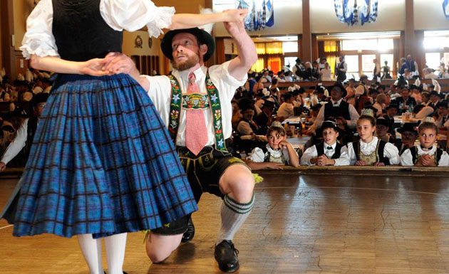 Bavarian folk dancers take part in a competition  