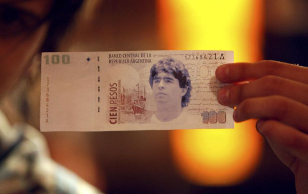 A member of the hand of god church celebrates Maradona's birthday