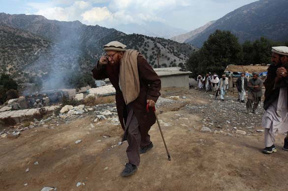 Korenghal Valley, Afghanistan: elder passes soldiers