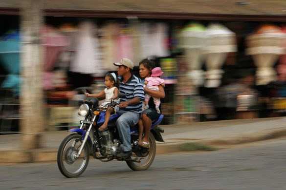 family on a motorbike in bolivia 