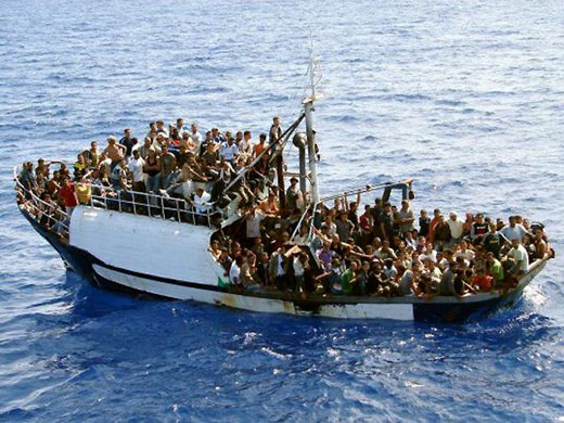 A  fishing boat carrying 300 illegal migrants in the Mediterranean sea