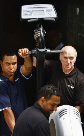 Removal men take possessions out of 10 Downing Street