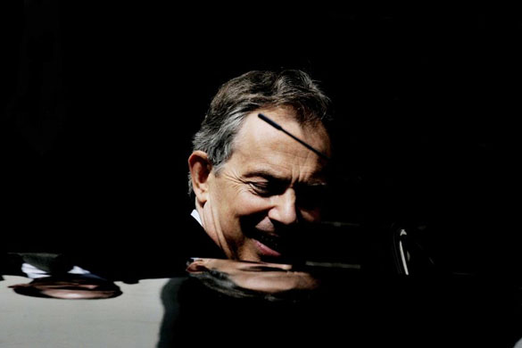 Mr Blair steps into his car