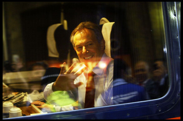 Mr Blair waits for the GNER train service to leave Kings Cross