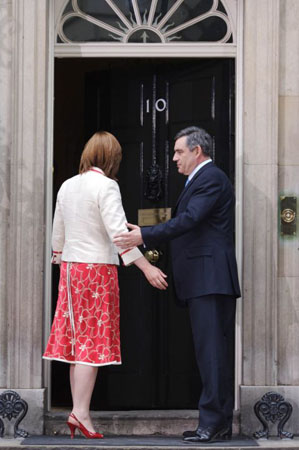 Mr Brown walks into No 10 for the first time as prime minister