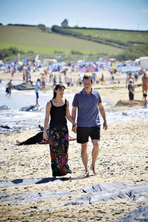 2008, Harlyn Bay, UK:  David Cameron and his wife Samantha relax on the first day of their summer holiday