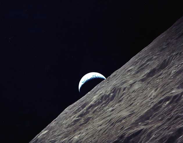earthrise over the moon
