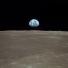 Apollo 11 to the Moon:  Earth rises over lunar horizon
