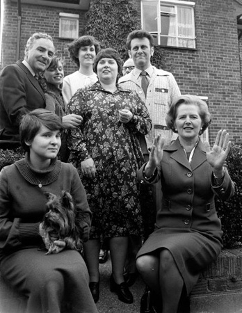 Margaret Thatcher and a family who have bought their council house