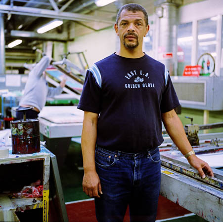 David, print workshop technician, professional screen printer. Making ‘No Smoking’ signs for commercial use. £.10.80 per week