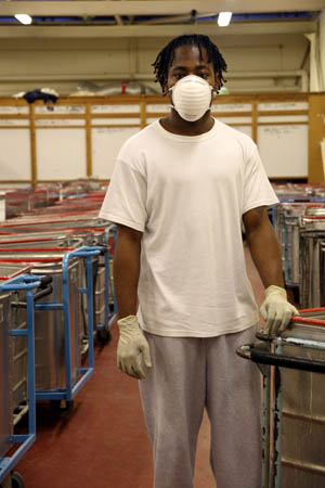 Del, works in commercial laundry. Bed linen from a local hospital is brought to the prison for cleaning. He sorts out the sheets depending on the level of dirt. £10.80 per week