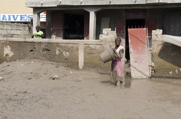 Many homes were lost under up to six feet of mud and flood water