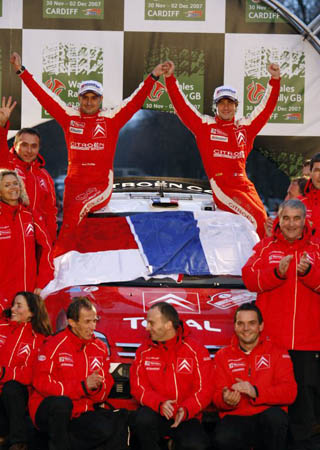 Sebastien Loeb celebrates winning the World Championship