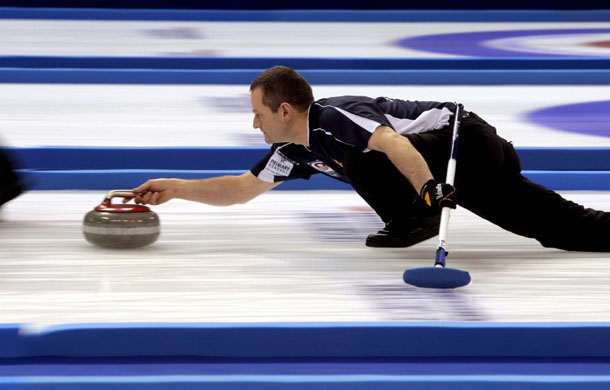 Peter Smith curling for Scotland