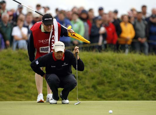 Padraig Hamilton lines up a putt