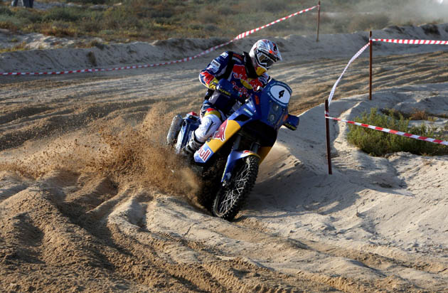 Francisco Lopez rides his motorbike during the UAE desert challenge