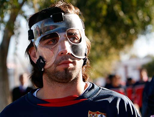 Footballer with a protective mask