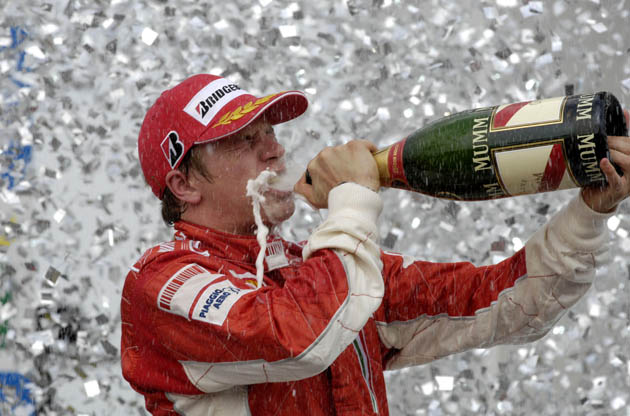 Kimi Raikonen drinks champagne