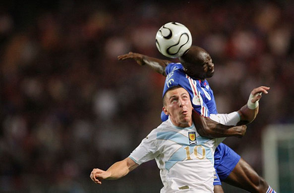France's Claude Makelele challenges Scotland's Scott Brown