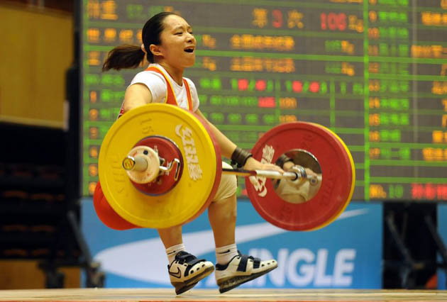 Chinese lifter Qiu Hongmei, a world record-holder in the clean and jerk, fails in an attempt in the women's 58kg category, during the national trials to qualify for the 2008 Beijing Olympic Games