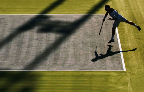 Nicolas Kiefer serves to Gilles Simon at the Rogers Cup