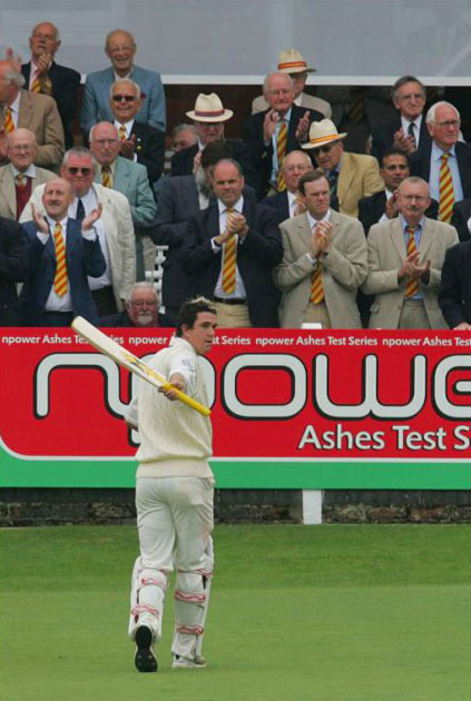 Kevin Pietersen is applauded back to the pavillion by MCC members after his maiden test century against Australia at Lord's in the first Ashes test