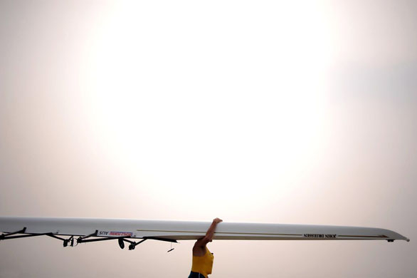 An Australian athlete prepares for a training session at the Shunyi Olympic rowing-canoeing park in Beijing